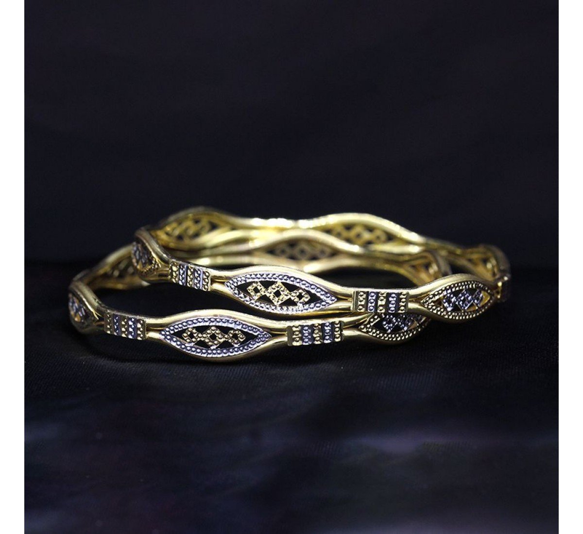 Inspired Evocative Gold Bangles